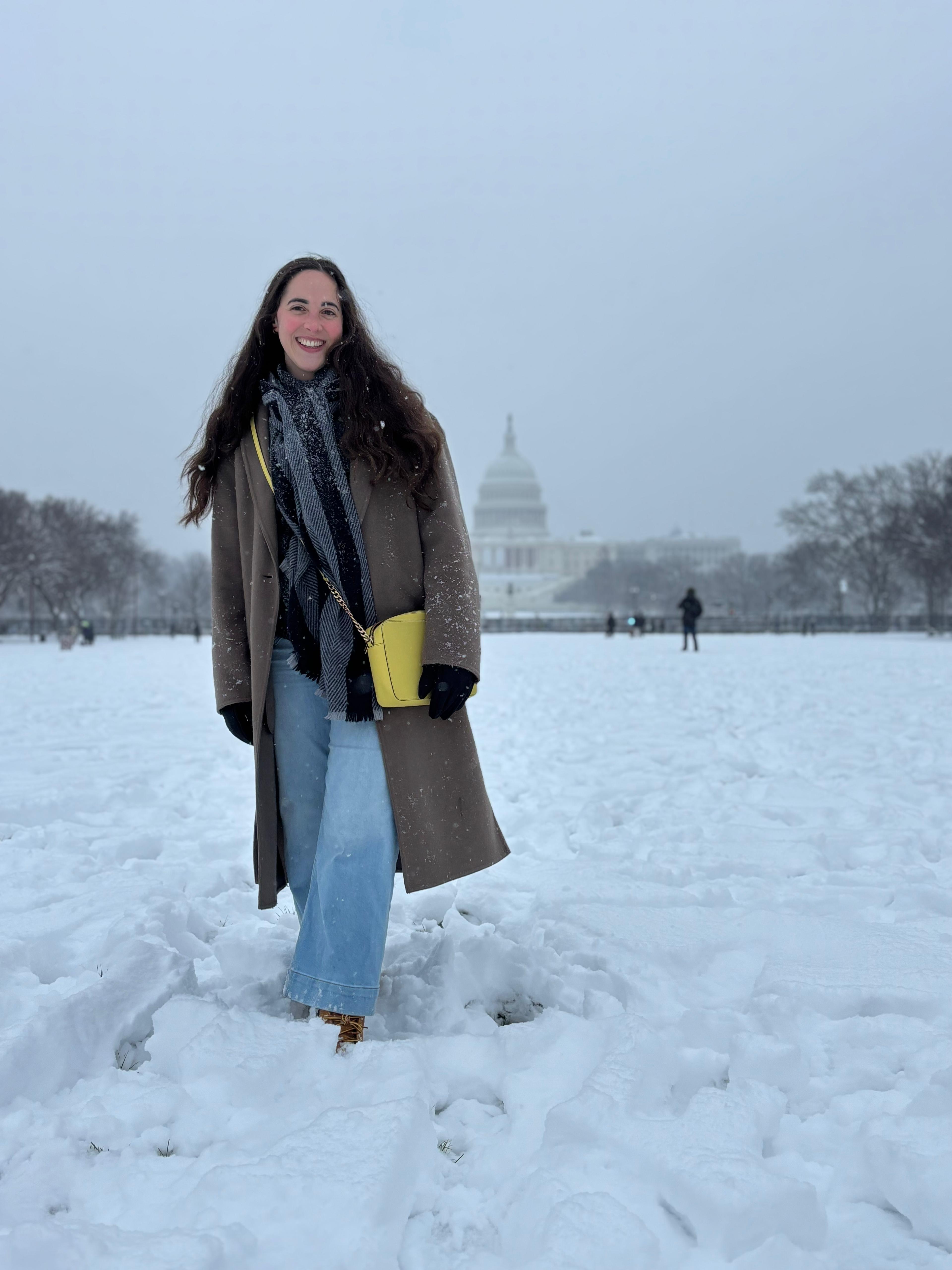 Photo of me, in the snow with the Capitol in the background